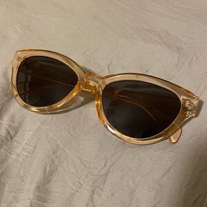 Orange sunglasses slight cat eye